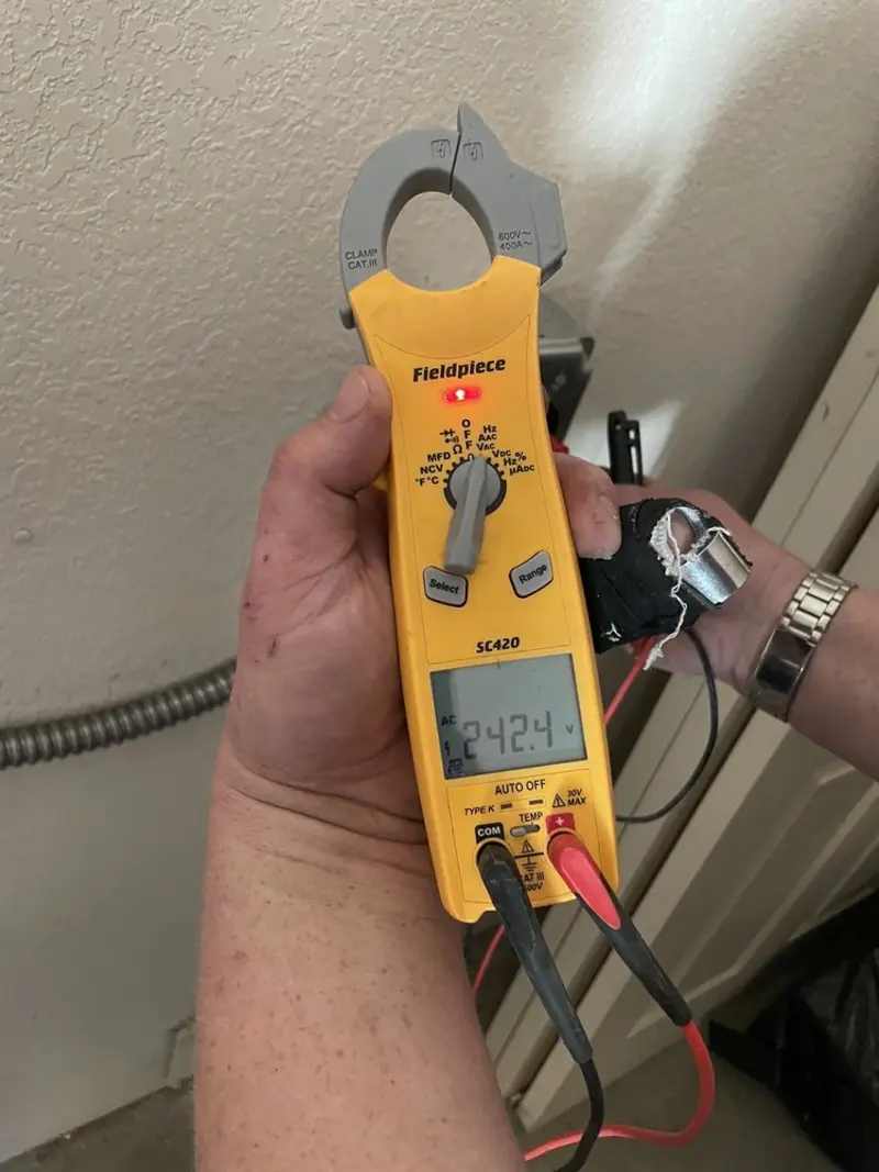 Voltage testing with clamp meter during Circuit Breaker Repair in Kelly